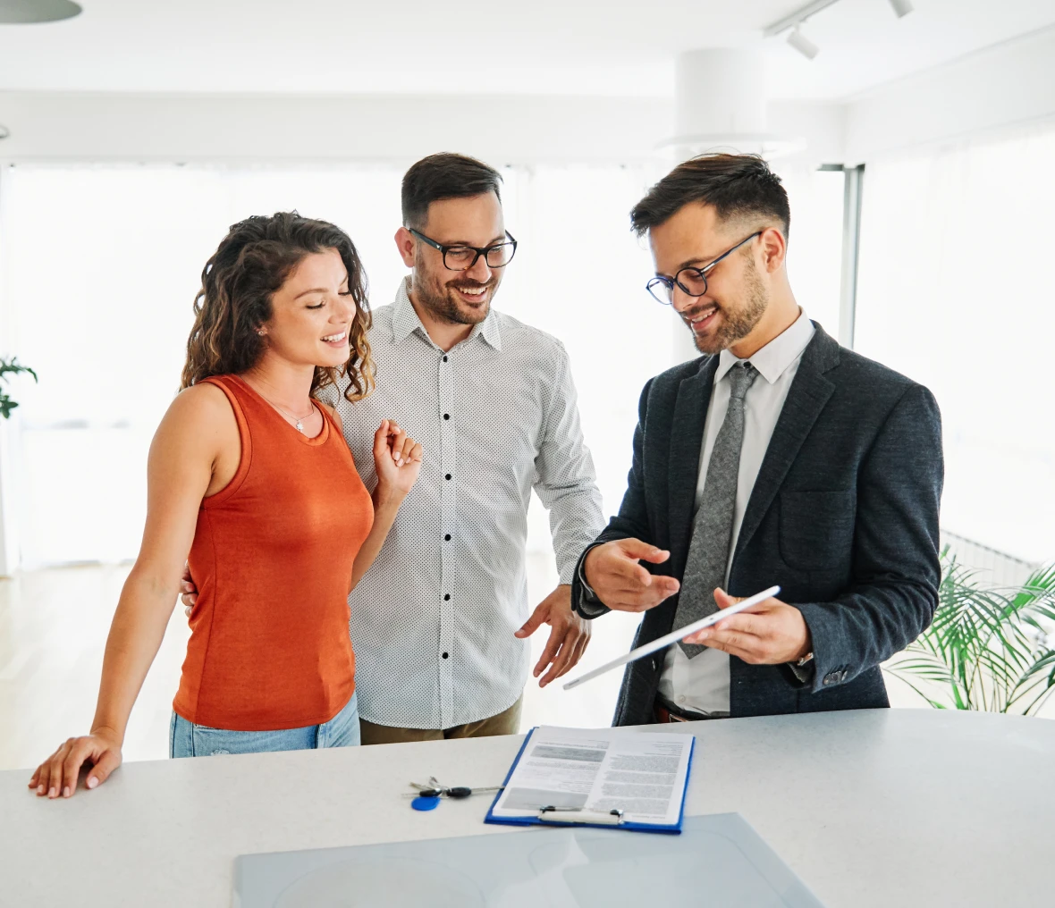 Homebuyers consulting with a professional advisor.